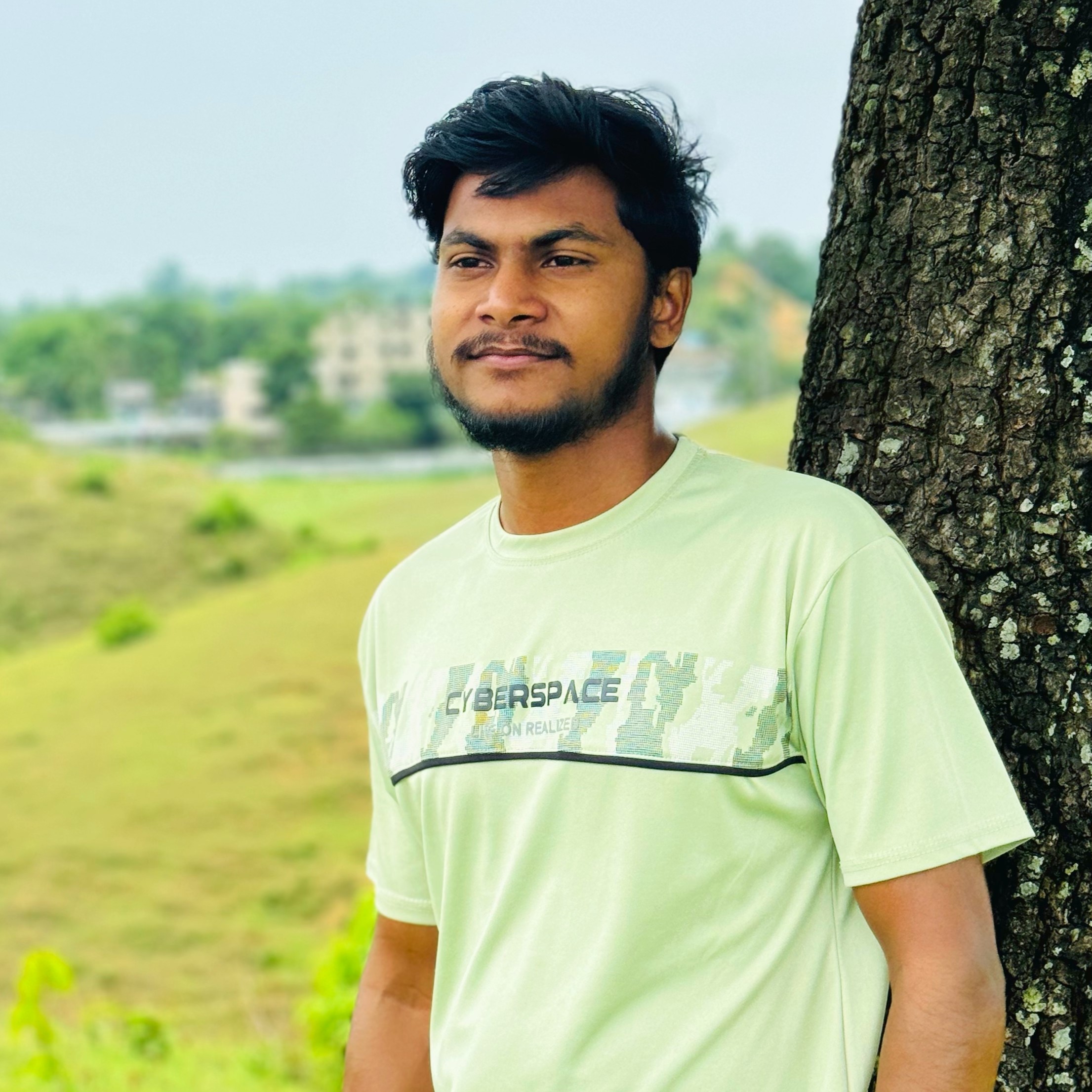 Omar Faruk - Full-Stack Web Developer working on a laptop
